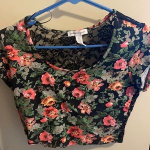 Floral crop top with black lace back. Never worn